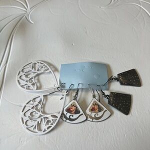 Elegant Trio of Earrings in White, Black, and Brown